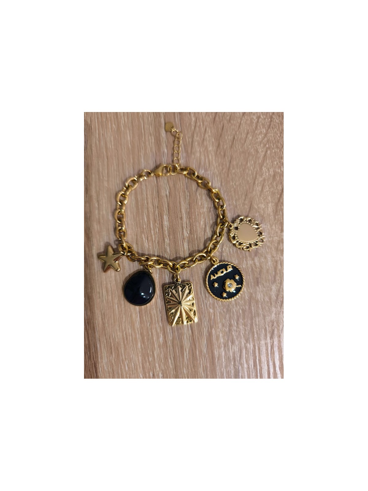 Bracelet doré avec médaillons noir l 1 vue de face l Tilleulmenthe mode boutique de vêtements femme en ligne